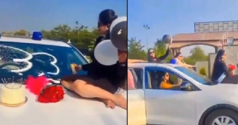 പൊലീസ് വാഹനത്തിന്റെ ബോണറ്റിൽ ഇരുന്ന് പൊലീസ് ഉദ്യോഗസ്ഥന്റെ ഭാര്യയുടെ ജന്മദിനാഘോഷം : വൈറലായി വീഡിയോ